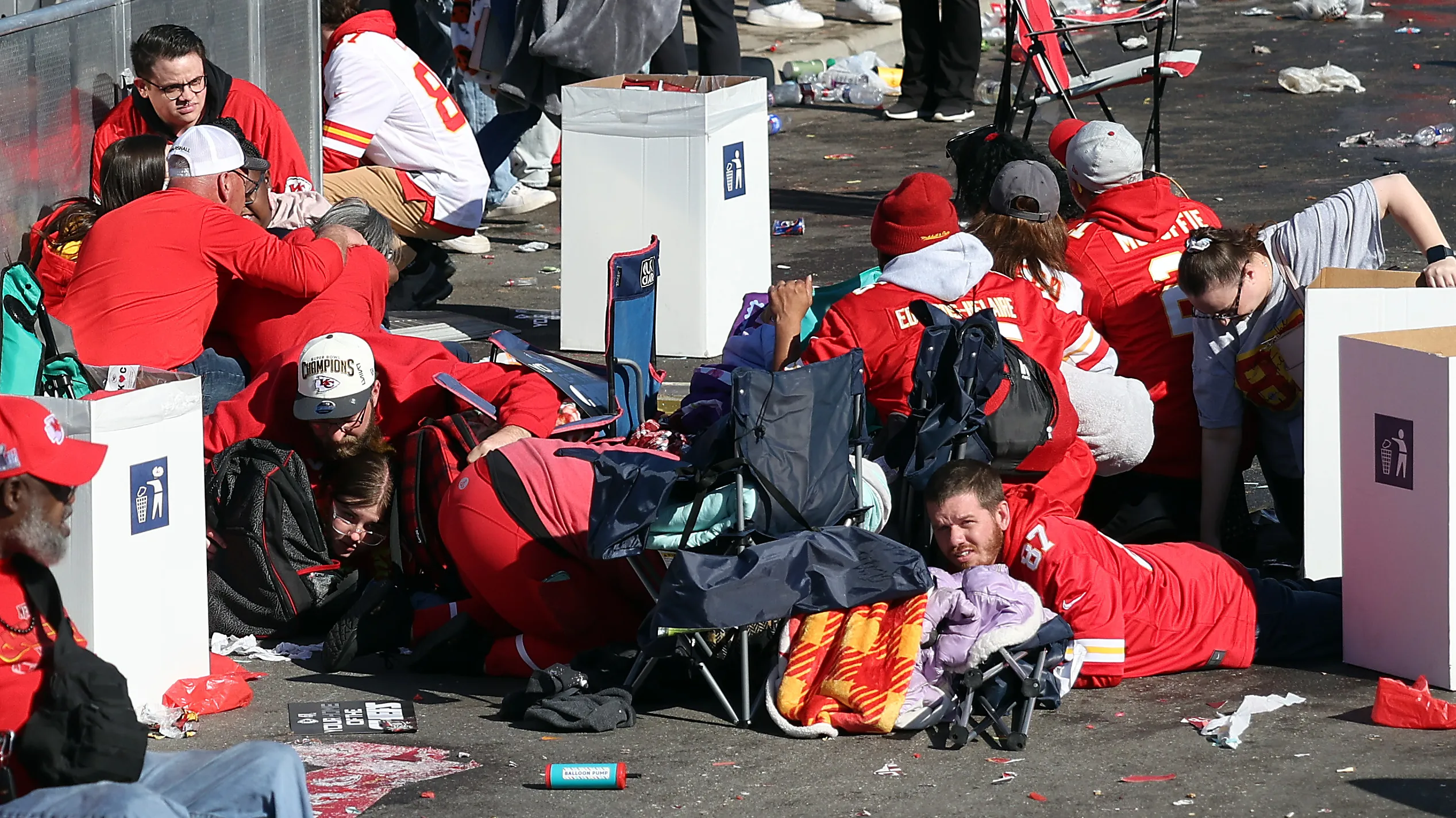 Three more adults are charged over Kansas City Parade shooting as prosecutors reveal SIX fired guns and 12 had weapons with them - but only five have been named