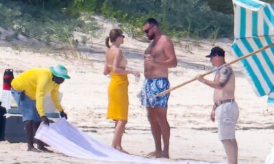 Fans angry over Taylor Swift and Travis Kelce's lack of privacy in Bahamas as images from their vacation went viral on social media