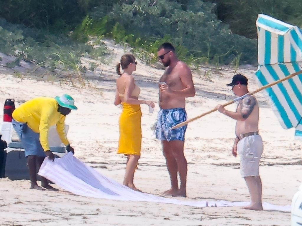 Fans angry over Taylor Swift and Travis Kelce's lack of privacy in Bahamas as images from their vacation went viral on social media