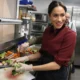 Watch: Meghan bakes and poses in ballgown to debut lifestyle business, American Riviera Orchard website linked to claims the Duchess will position herself as rival to ‘domestic goddesses’ such as Martha Stewart