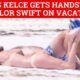 Travis Kelce naps in the Bahamas sun with Taylor Swift and places hand on her booty to know she is still there