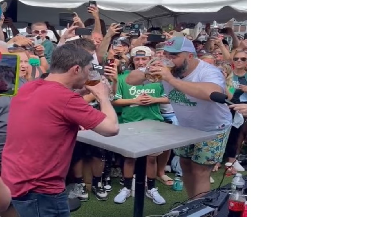 Watch:Travis and Jason Kelce CLASH over who would win a drinking contest as retired star backs himself after 'MVP' display at Chiefs' Super Bowl party while Taylor Swift's boyfriend says he's beaten his brother 'three to five times'