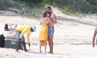 Taylor Swift and Travis Kelce in sexiest snaps yet as NFL star caresses singer's butt