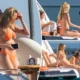 Patrick Mahomes' wife Brittany flashes major underboob in tiny orange bikini on a private yacht while enjoying a girls' trip to Cabo San Lucas; Patrick Mahomes' wife left little to the imagination