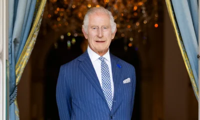 Striking New Royal Photo Shows King Charles Sitting Alone Recording a Message from Buckingham Palace, It was taken in Buckingham Palace's 18th Century Room