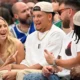 Mahomes, who tweeted his excitement after the Mavs' Game 2 victory, saying, "See y'all in Dallas!!," made good on his promise, arriving courtside with his wife Brittany.