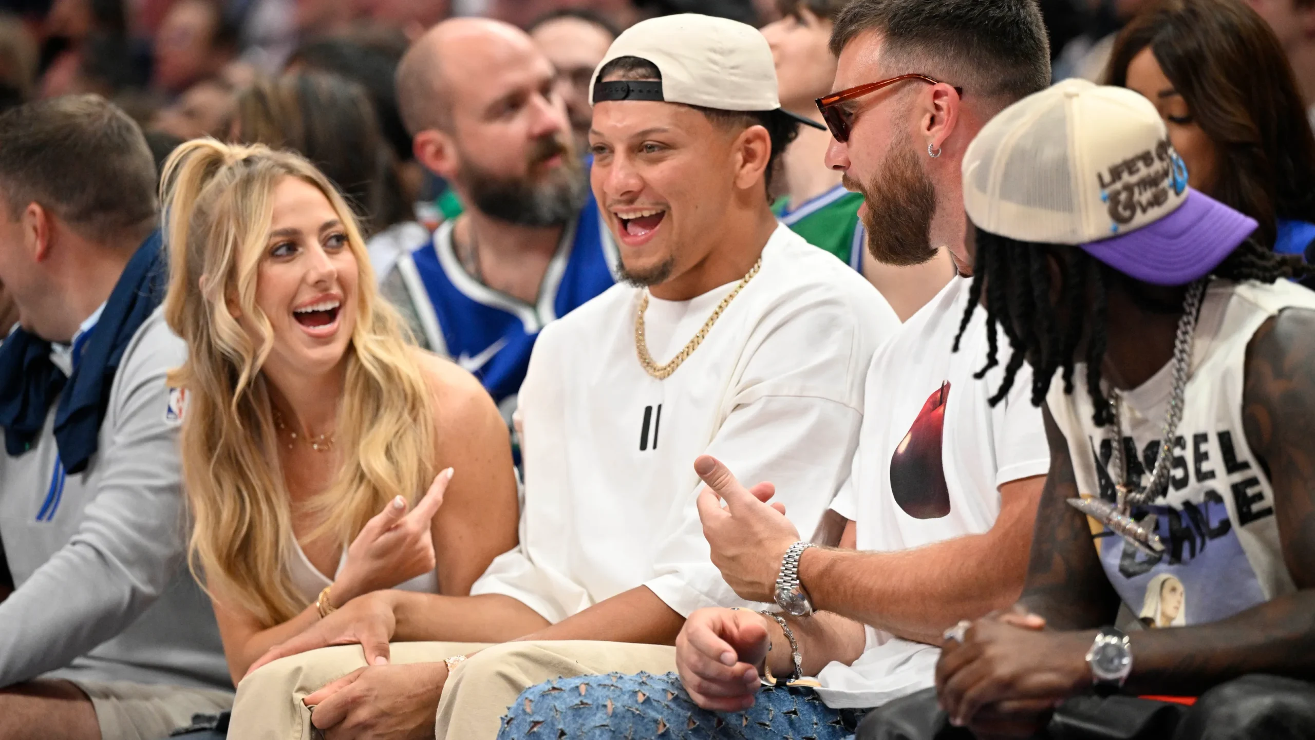 Mahomes, who tweeted his excitement after the Mavs' Game 2 victory, saying, "See y'all in Dallas!!," made good on his promise, arriving courtside with his wife Brittany.