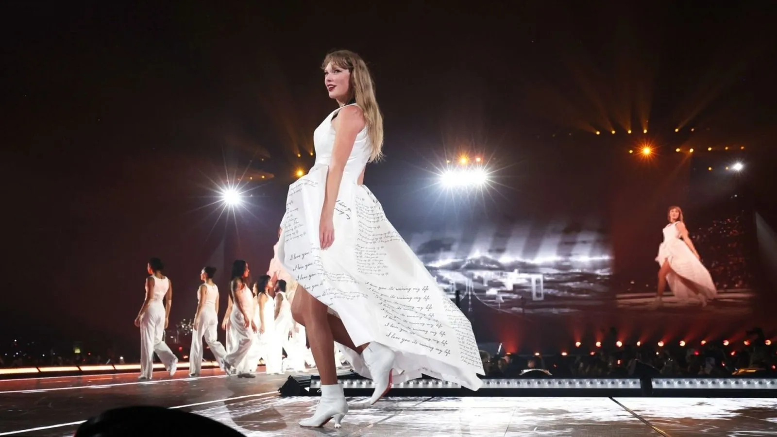 Taylor Swift appears to have a HICKEY on her neck during Stockholm concert after enjoying romantic getaway with boyfriend Travis Kelce