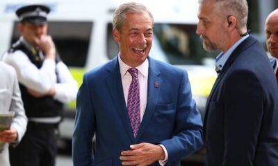 Is Nigel Farage a secret Swiftie? Reform leader sports friendship bracelet synonymous with Taylor Swift fans on the campaign trail while the singer heads to Liverpool for second performance of UK Eras tour