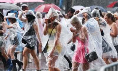 Taylor Swift fans brave the elements as the countdown begins for megastar's first UK Eras Tour concert in Edinburgh - after camping overnight to bag the best spots and merch