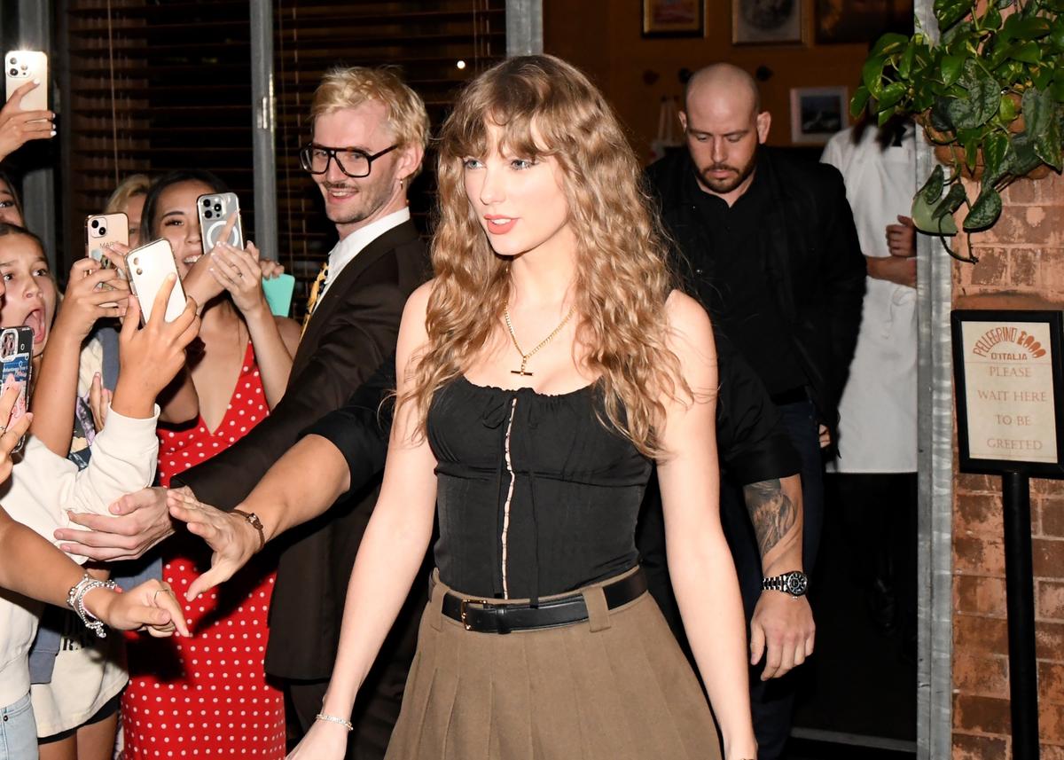 What is Taylor Swift wearing in Scotland? Eras Tour star spotted in $169 corset top and gives subtle nod to boyfriend Travis Kelce in Surry Hills