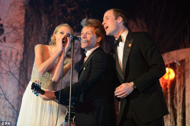 William goes wild with rock royalty: Prince joins Jon Bon Jovi and Taylor Swift on stage for impromptu performance of Livin' On A Prayer