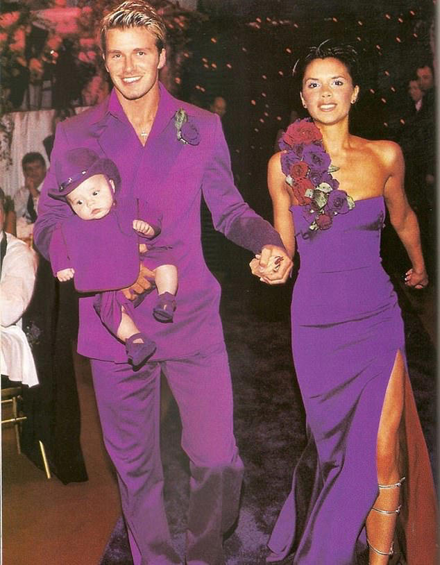 EXCLUSIVE: David Beckham is teased by wife Victoria for looking like the dancing man emoji after they dig out their iconic purple wedding outfits from storage for 25th wedding anniversary